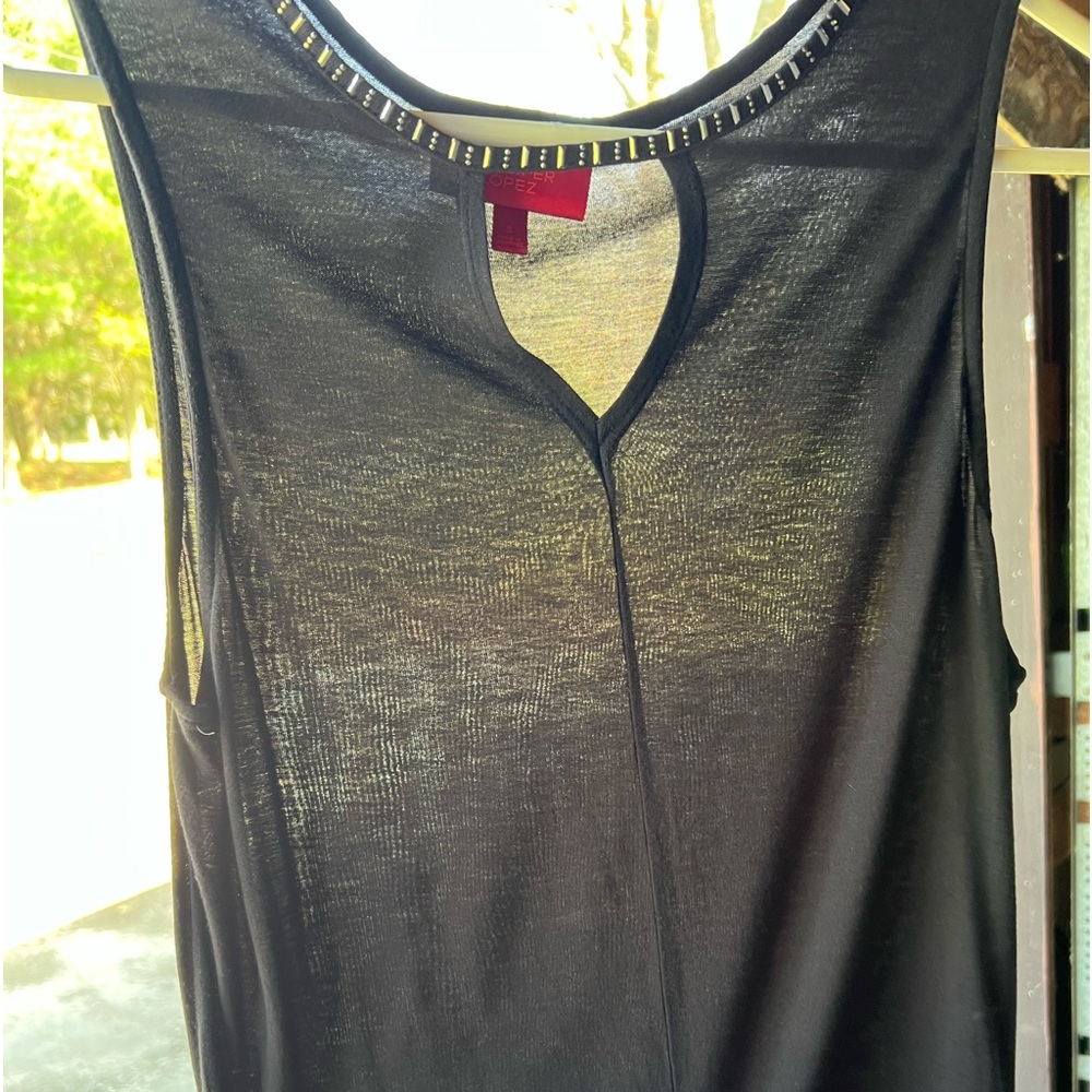 Beautiful black blouse with sequins around the neck